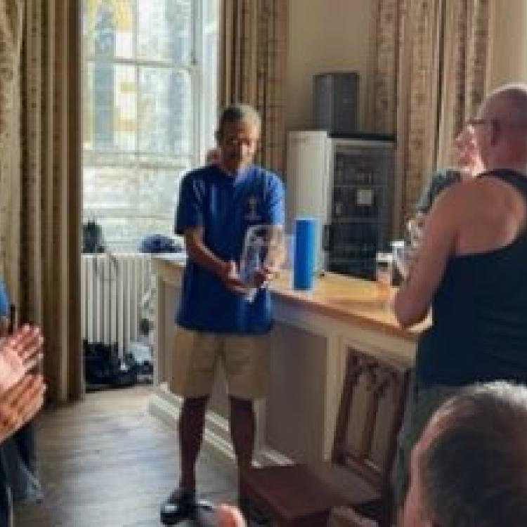 Shihan Chris Thompson, Chief Instructor, 9th Dan, presented with the 45th Anniversary trophy by Sensei Neville Smith 8th Dan